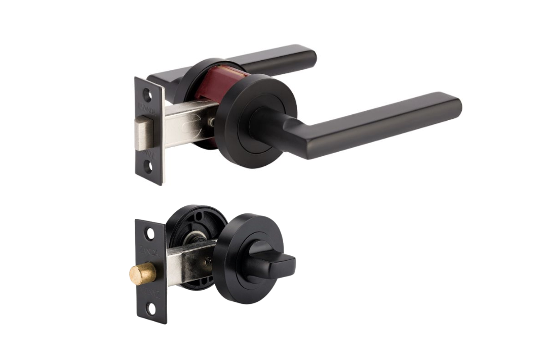 Product picture of the Zanda Epic Door Handle on Round Rose Matt Black privacy set with separate kit on a white background.