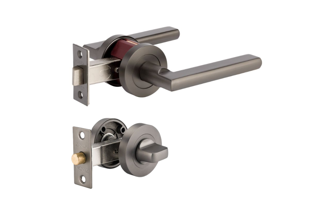 Product picture of the Zanda Epic Door Handle on Round Rose Graphite Nickel privacy set separate kit on a white background.