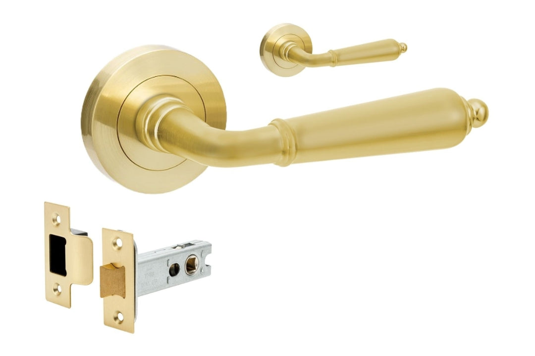 Gold door handle and lock mechanism on a white background