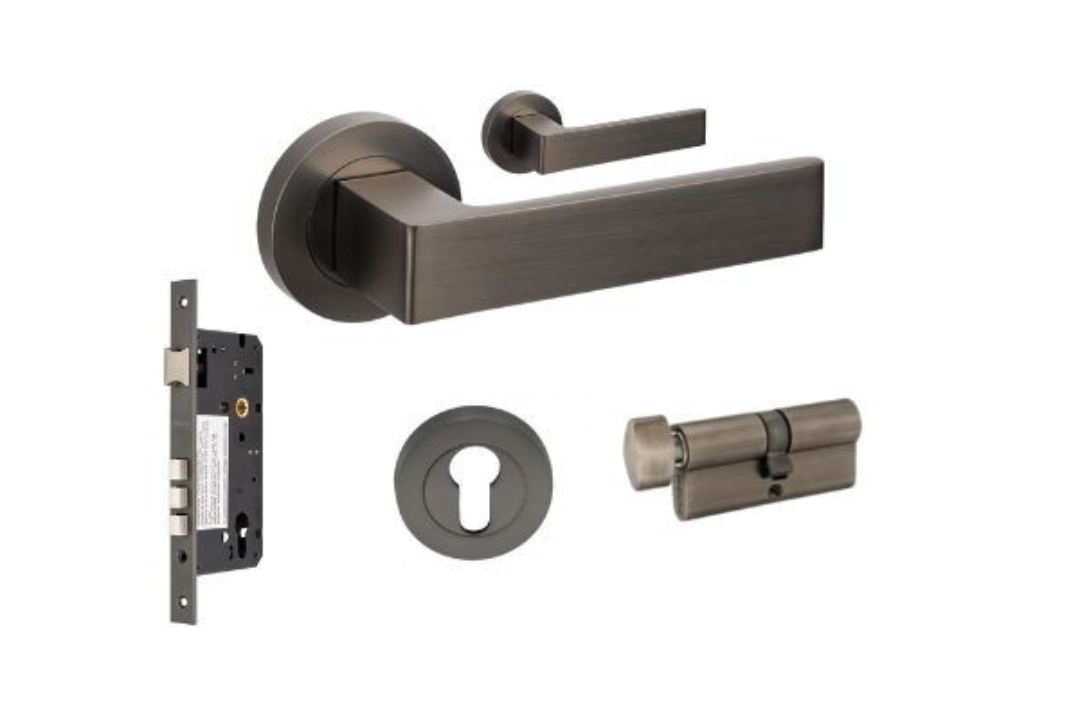 Product picture of the Zanda Boston Door Handle on Round Rose Graphite Nickel Entry Set Key/Turn on a white background.