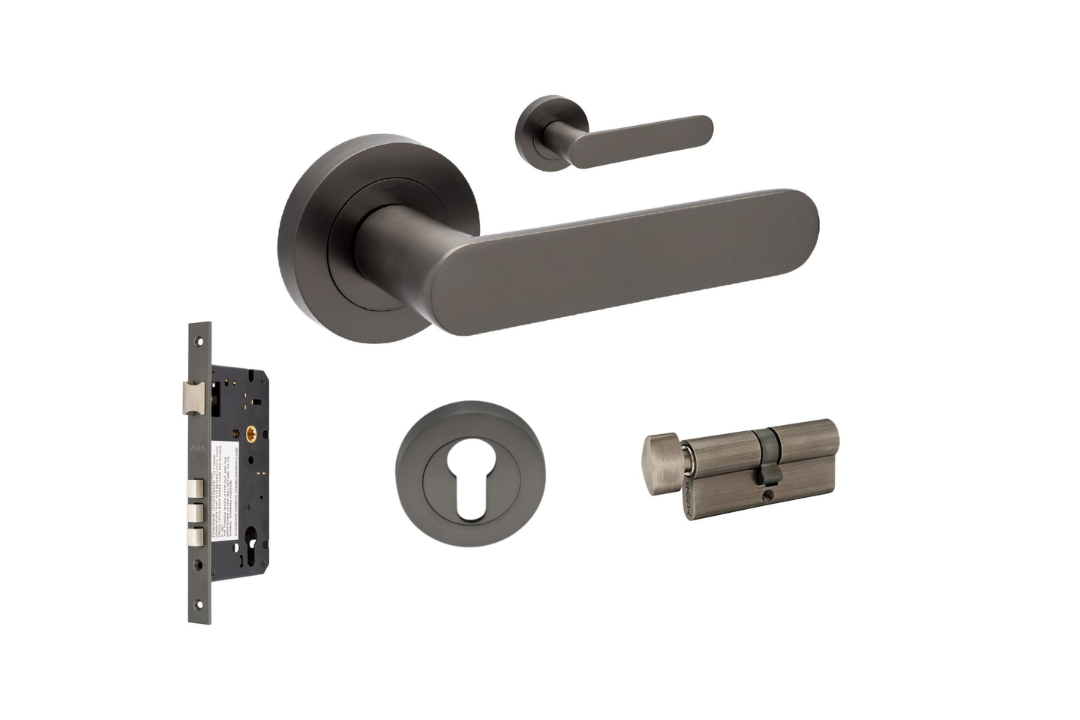 Product picture of the Zanda Duke Door Lever Handle on Round Rose Graphite Nickel entry set with key/turn cylinder, on a white background.