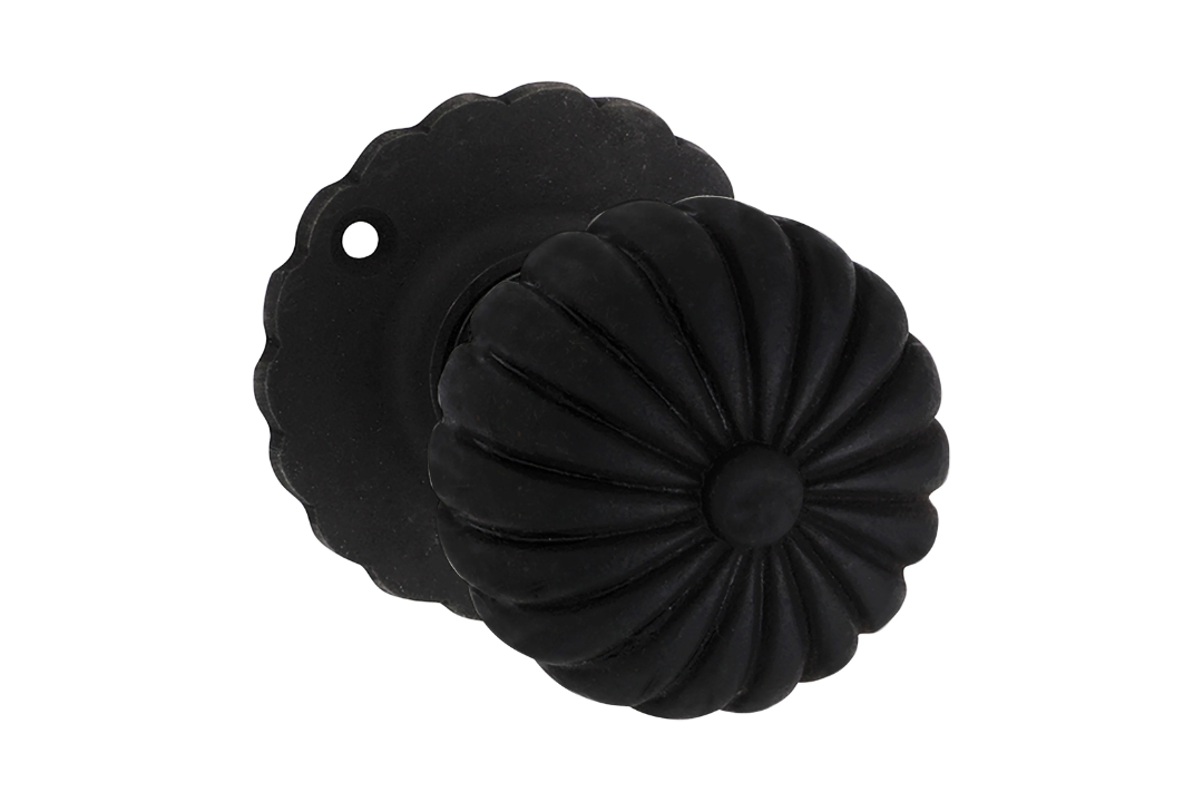 Product picture of the Tradco Fluted Mortice Knob on Round Rose Black Antique Finish 55mm 1012 on a white background.
