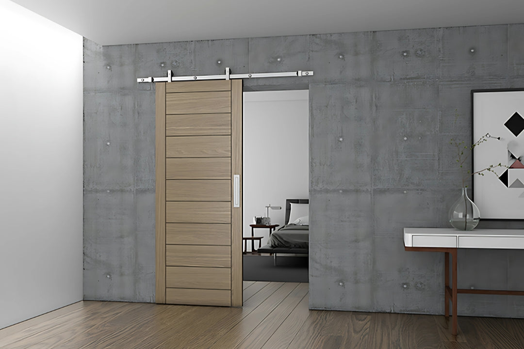 The JNF Charriot Barn Door Sliding Kit 1700mm IN.15.901.I installed on a brown wooden sliding door.