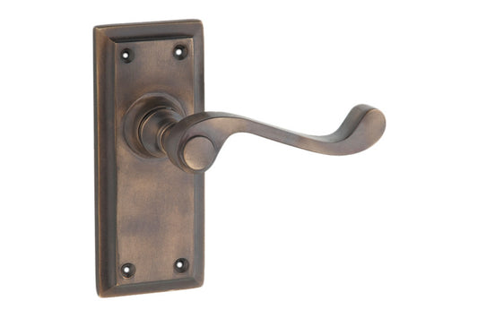 Product picture of the Architectural Choice Milton Lever Latch Antique Brass 125x50 on a white background.