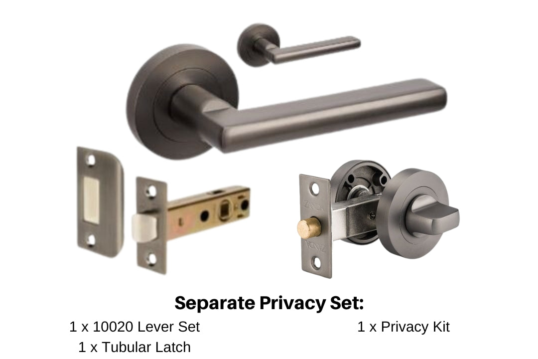 Product image of the Urban Gun Metal Grey Door Handle Separate Privacy Set with writing below mentioning what is in this particular selection. 1 x 10020 Lever Set, 1 x Tubular Latch and 1 x Privacy Kit.