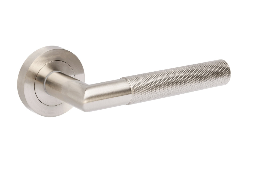 The Zanda Vertex contemporary knurled lever door handle with concealed rose fixture lever handle set only.