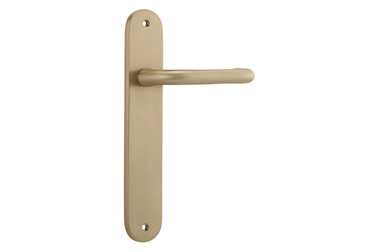 Iver Oslo Lever Handle on Oval Plate Passage in Brushed Brass – Architectural brass door handle for luxury projects.