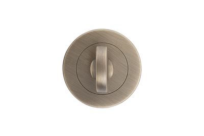 Product picture of the Apollo Design Traditional Privacy Turn Round 50mm Antique Brass on a white background.