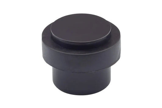 Product picture of the Matt Black Round Floor Door Stop 38mm on a white background.