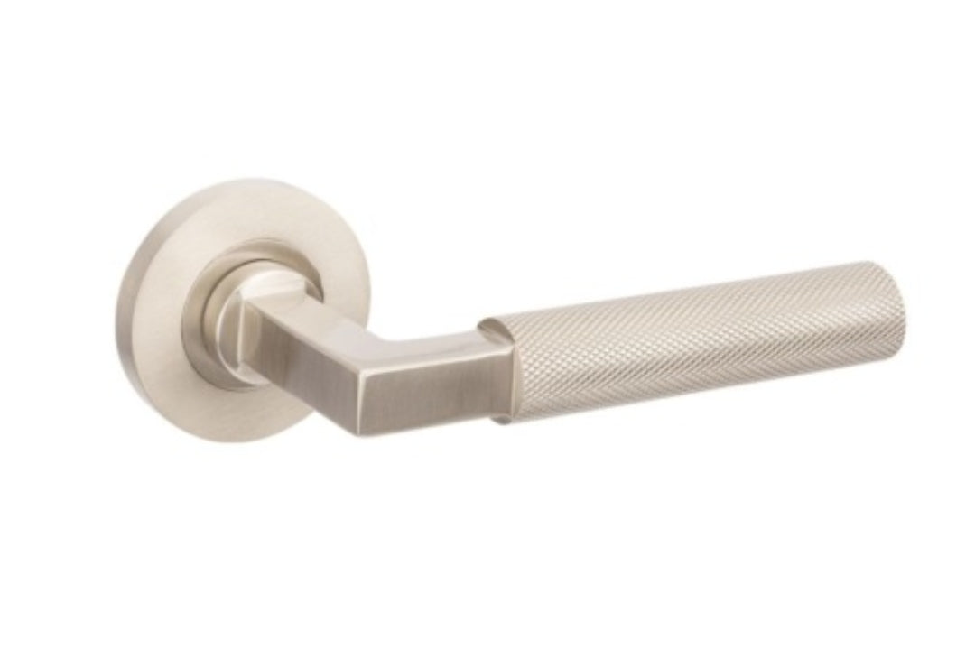 Product image of the Zurich Brushed Nickel Door Handle on a white background.