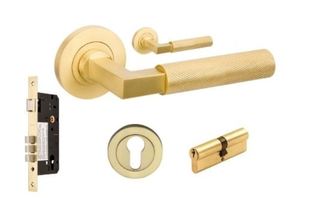 Product image of the Zurich Satin Brass Door Handle Entry Door Set 1 on a white background.