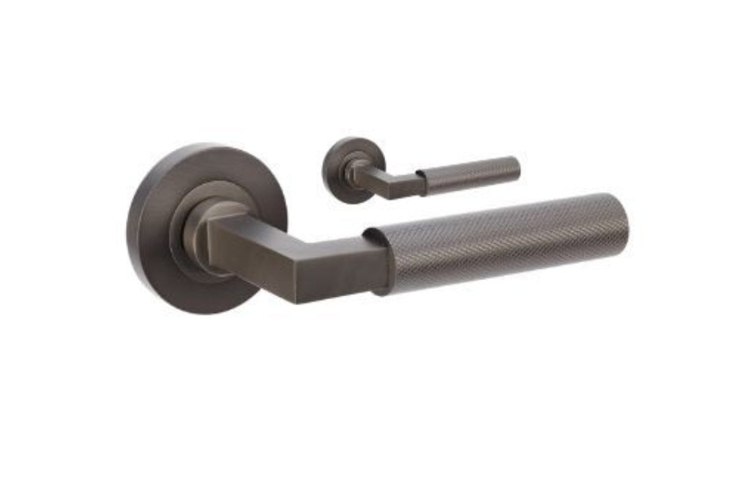 Product image of the Zurich Graphite Nickel Door Handle Leverset Only on a white background.