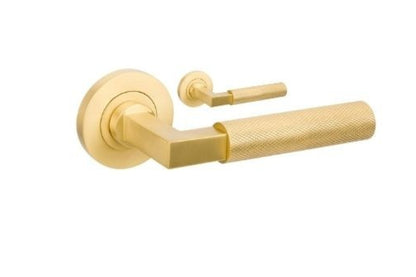 Product image of the Zurich Satin Brass Door Handle Leverset Only on a white background.