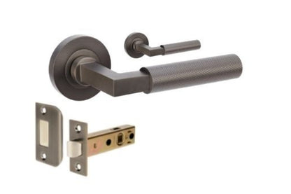 Product image of the Zurich Graphite Nickel Door Handle Passage Set on a white background.