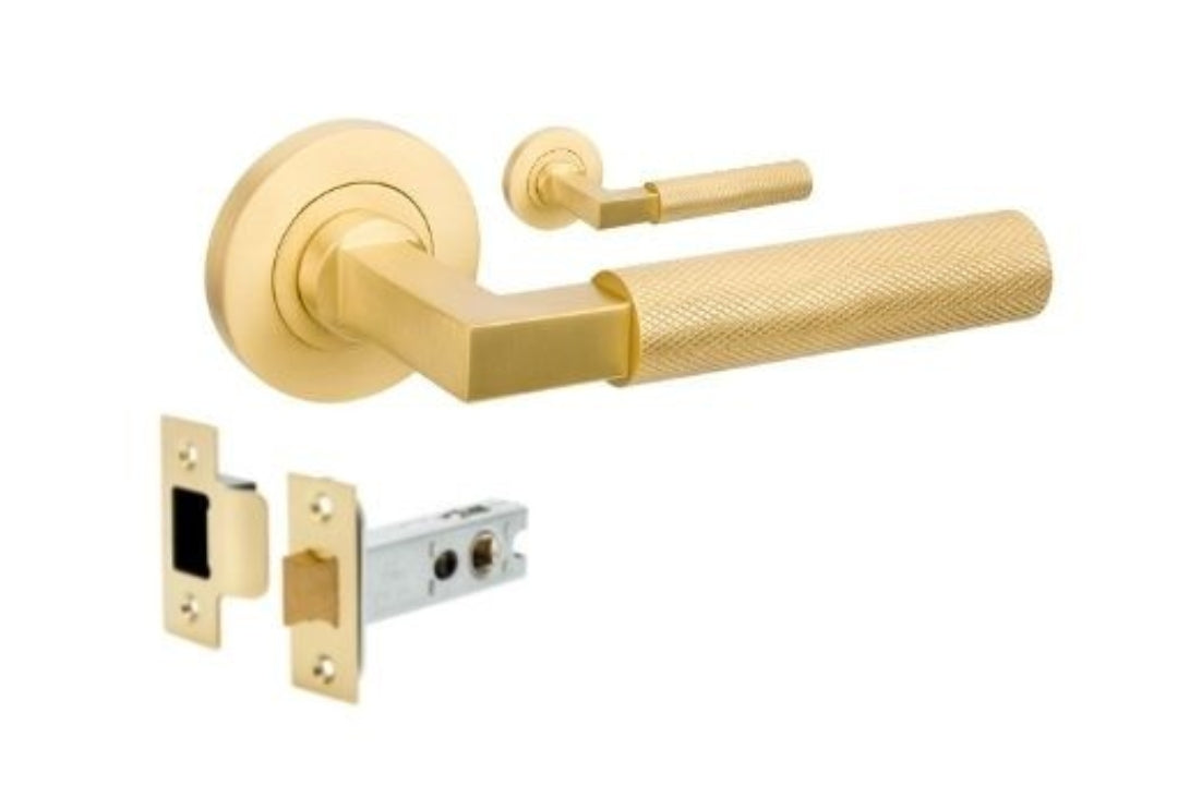 Product image of the Zurich Satin Brass Door Handle Passage Set on a white background.