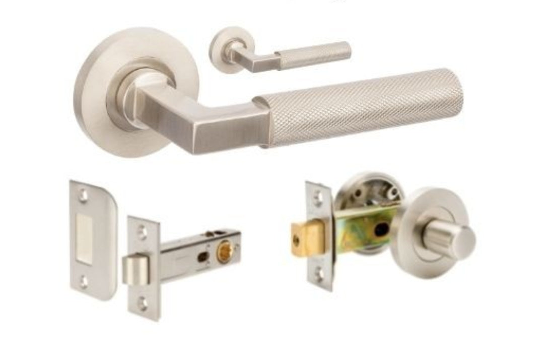 Product image of the Zurich Brushed Nickel Door Handle Privacy Set on a white background.