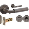 Product image of the Zurich Graphite Nickel Door Handle Privacy Set on a white background.