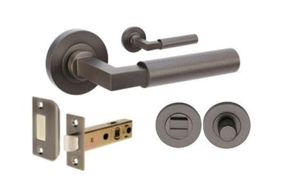 Product image of the Zurich Graphite Nickel Door Handle Privacy Set on a white background.