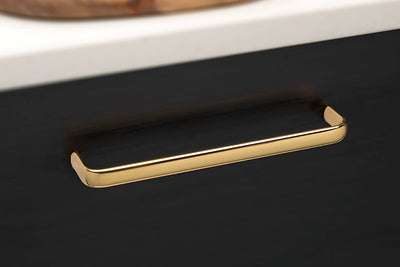 Insitu of Kethy Trumpet Cabinet Handle in Polished Brass Gloss – Elegant brass pull handle for high-end cabinetry.