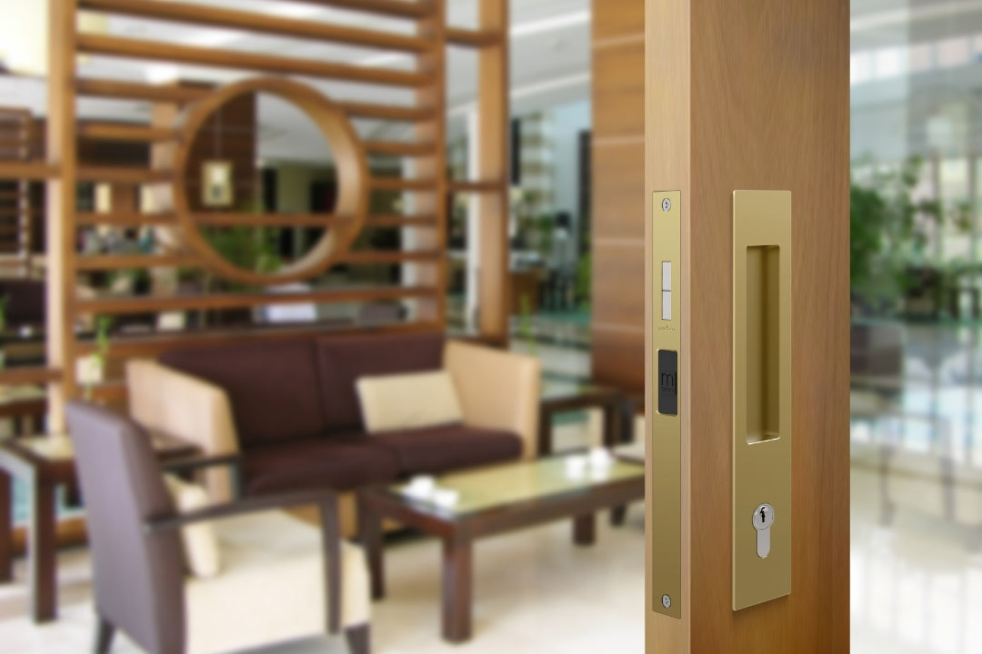 Insitu image of the BRS8104/SET Satin Brass Mardeco Flush Pull Euro Lockset installed on residential wooden doors opening out to an alfresco area.