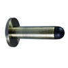 Product image of the Antique Brass Pencil Door Stop 80mm on a white background.