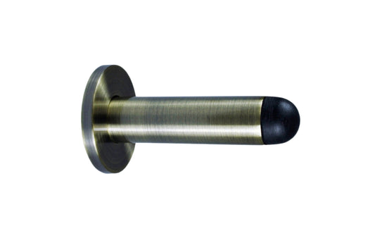 Product image of the Antique Brass Pencil Door Stop 80mm on a white background.