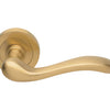 Product image of the Satin Brass Manital Erica Door Handle Lever Set on Round Rose 50mm on a white background.