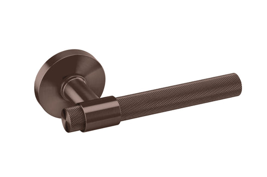 Bronze door handle on a white background