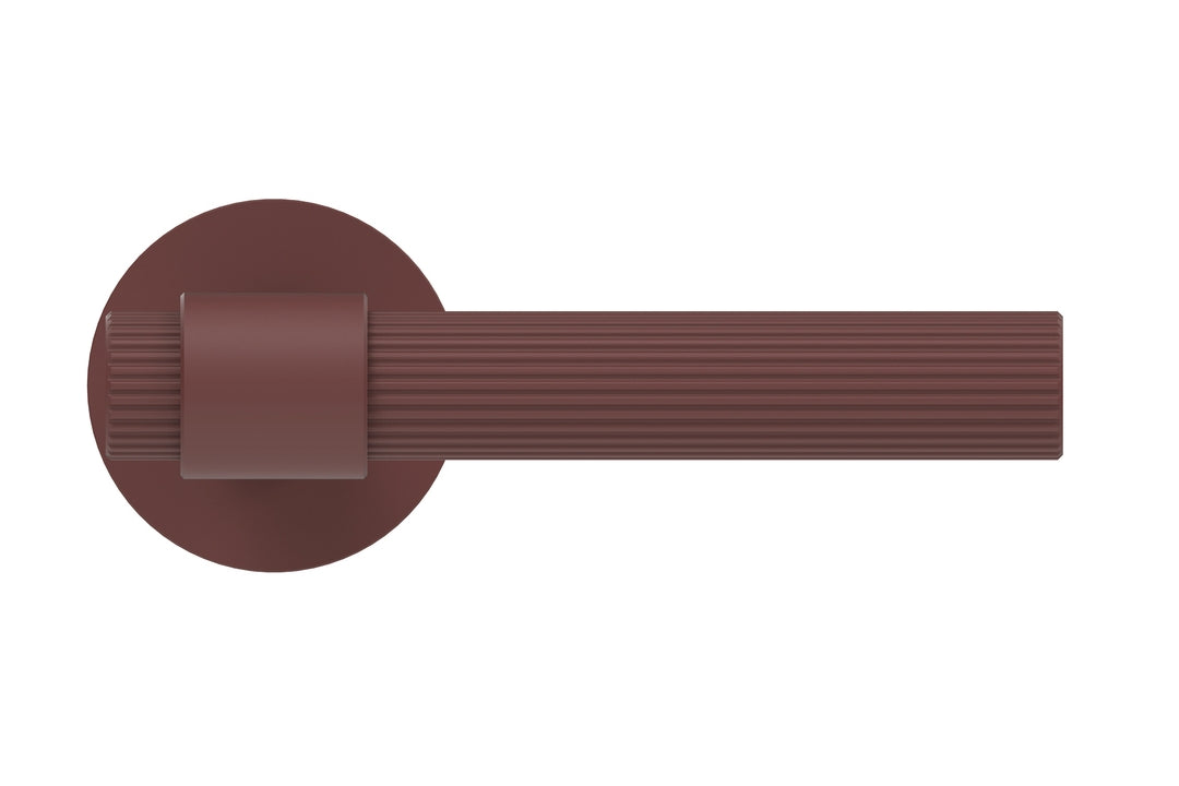 Front view of the Aged Red lever handle by JNF on a white background.