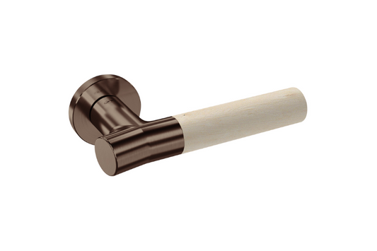 Product picture of the Wood Nature Antique Brass Birch Door Handle on a white background.