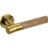 Product picture of the Wood Nature Satin Brass Oak Door Handle on a white background.