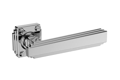Art Deco Collection On Rose polished handle with rosette — premium art deco door hardware on a white background.