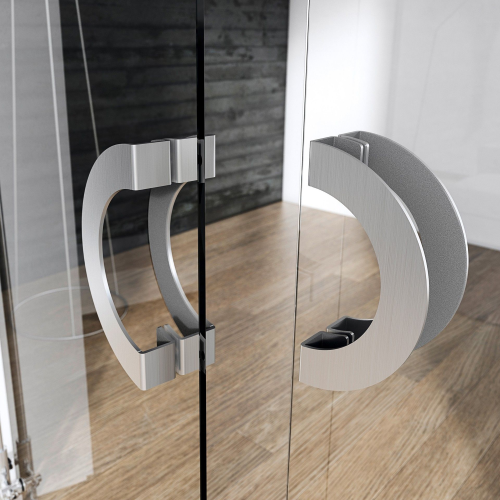 Picture of the Arc Brushed Chrome Pull Handle on a set of glass French doors with a wooden floor in the background.