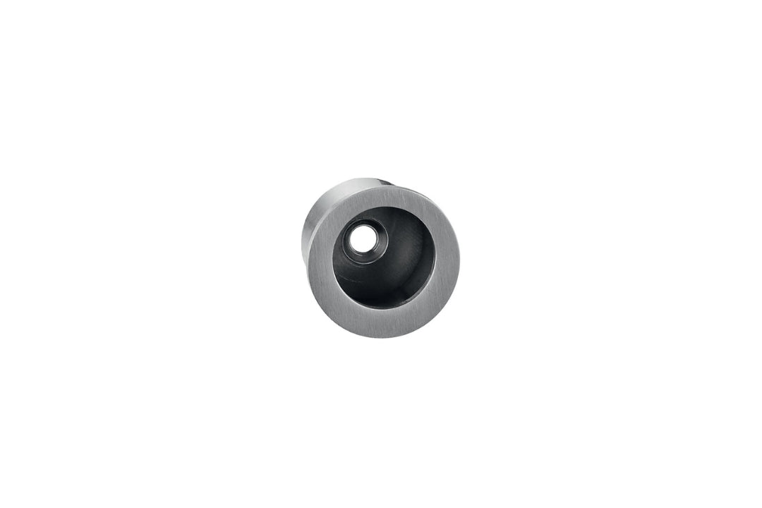 Metallic cylindrical object with a central hole on a white background