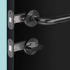 Insitu image of the Matt Black Privacy Bolt installed on a black door with a generic lever set.