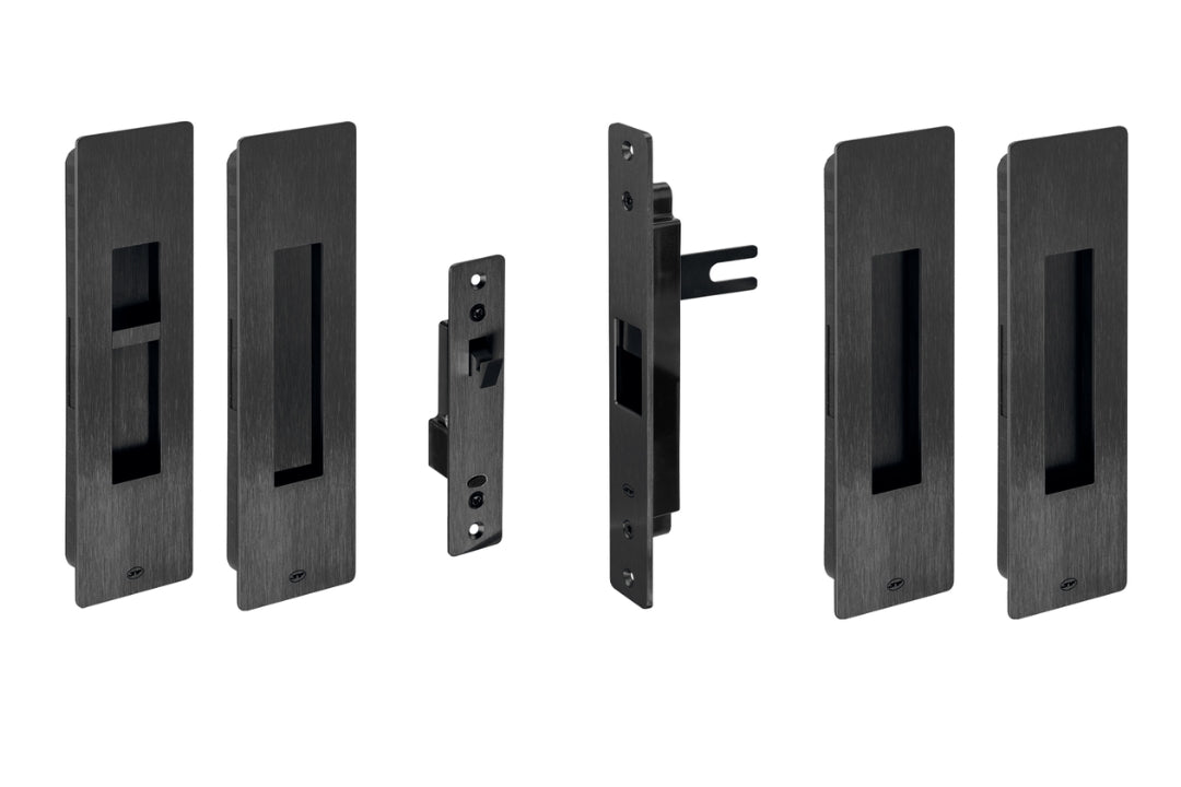 Set of black door handles and lock mechanism on a white background