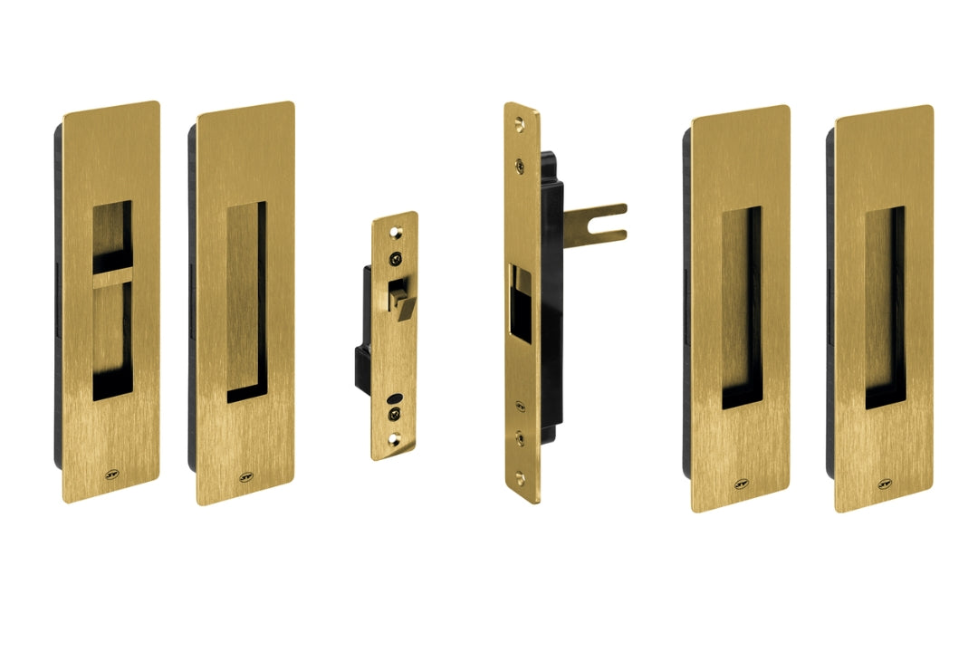 Set of Gold door handles and locks on a white background