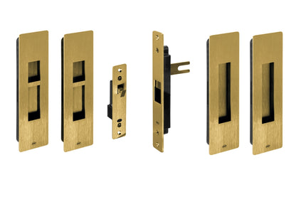 Set of Gold door handles and locks on a white background