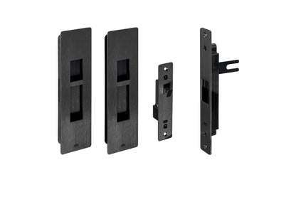 Set of black door hardware components on a white background