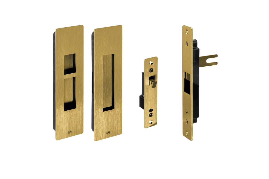 Set of gold door lock mechanisms on a white background