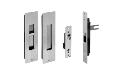 Set of metallic door lock components on a white background