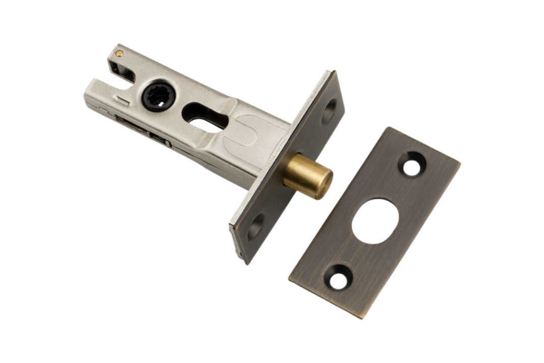 Product image of the 45mm backset Antique Brass Privacy Bolt on a white background.