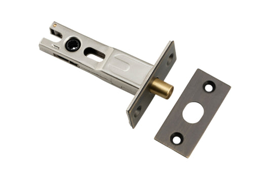 Product image of the 60mm backset Antique Brass Privacy Bolt on a white background.