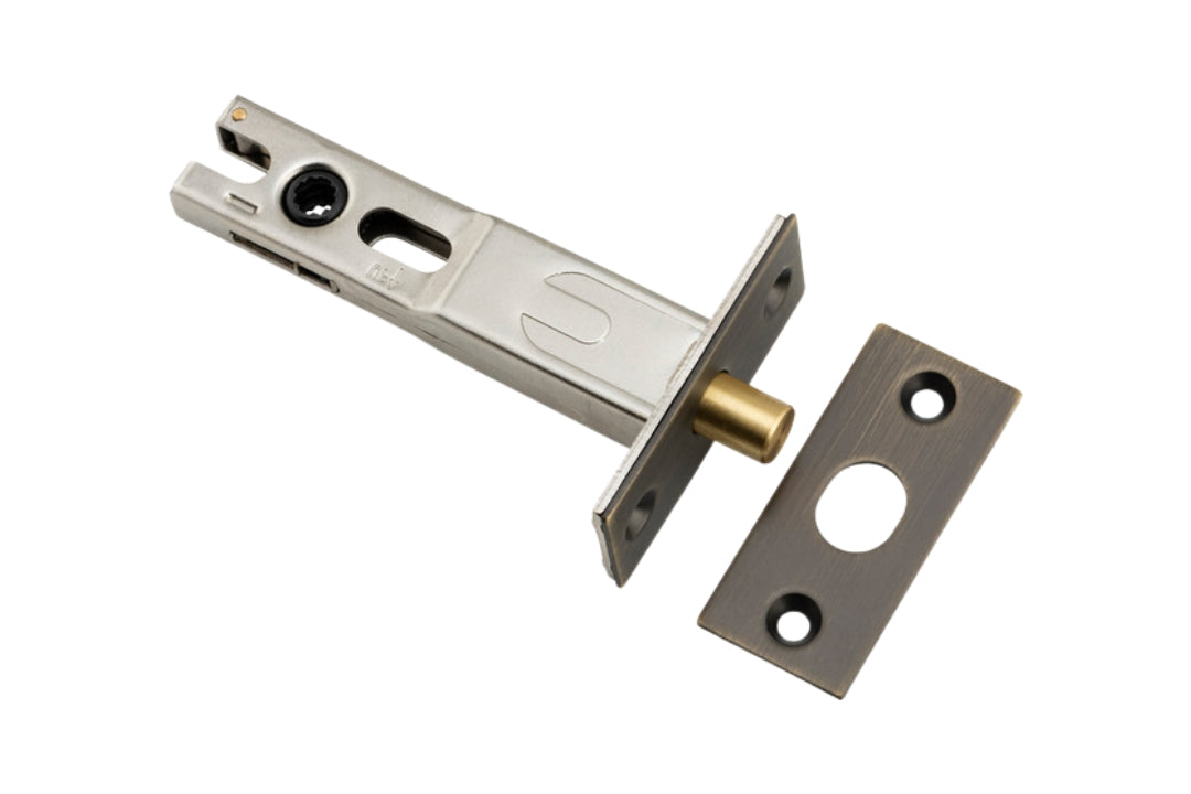 Product image of the 70mm backset Antique Brass Privacy Bolt on a white background.