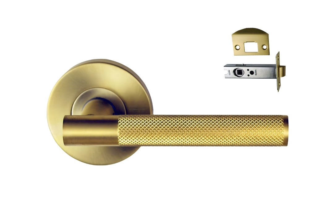 Nidus Knurled Domici Lever on Rose in Satin Brass with latch for passage set.