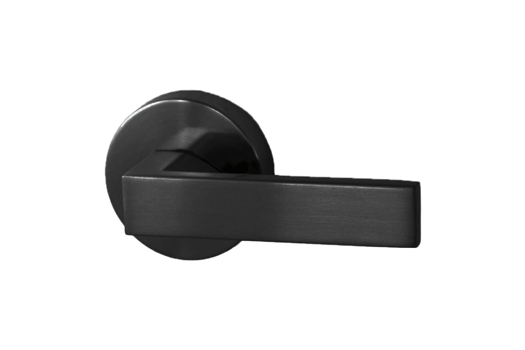 Image of the Matt Black Nidus Lonsdale Door Lever Round Passage Set on a white background.