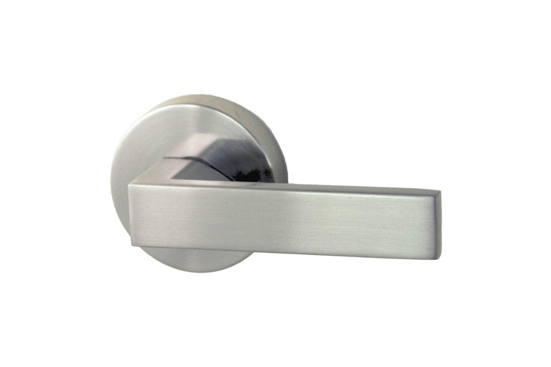 Image of the Brushed Nickel Nidus Lonsdale Door Lever Round Passage Set on a white background.