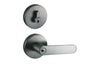 Image of the Graphite Grey Nidus Spring Door Lever Round Combo Entrance Set on a white background.