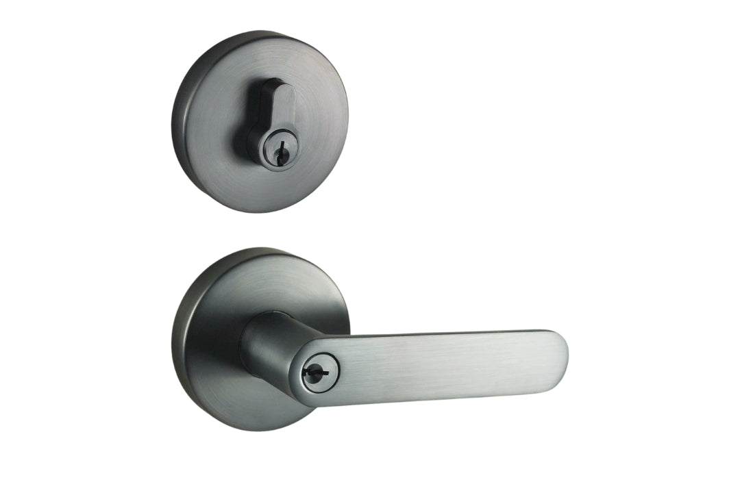Image of the Graphite Grey Nidus Spring Door Lever Round Combo Entrance Set on a white background.