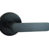 Image of the Matt Black Nidus Spring Door Lever Round Passage Set on a white background.